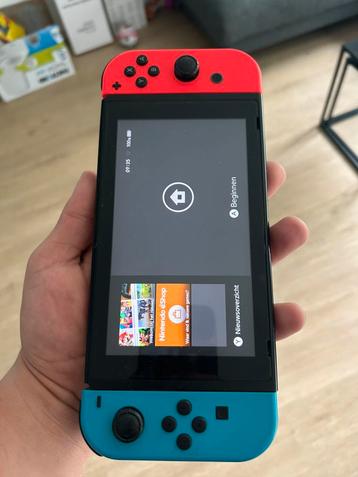 Nintendo switch met diverse games en accessoires beschikbaar voor biedingen