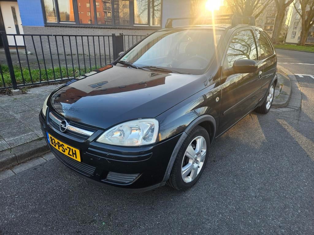 Opel Corsa 1.2 16V 3D 2004 Zwart, Auto's, Opel, Voorwielaandrijving, 74 pk, Zwart, Origineel Nederlands