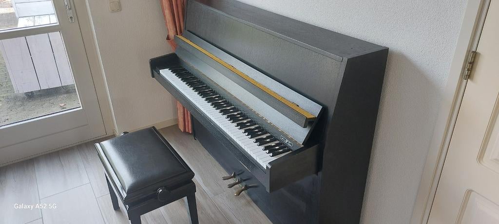 Piano met pianobank, Ophalen