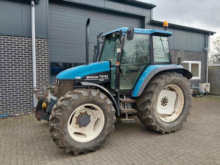 New Holland TS 110 met Fronthef en PTO, Zakelijke goederen, Agrarisch | Tractoren, New Holland, 80 tot 120 Pk