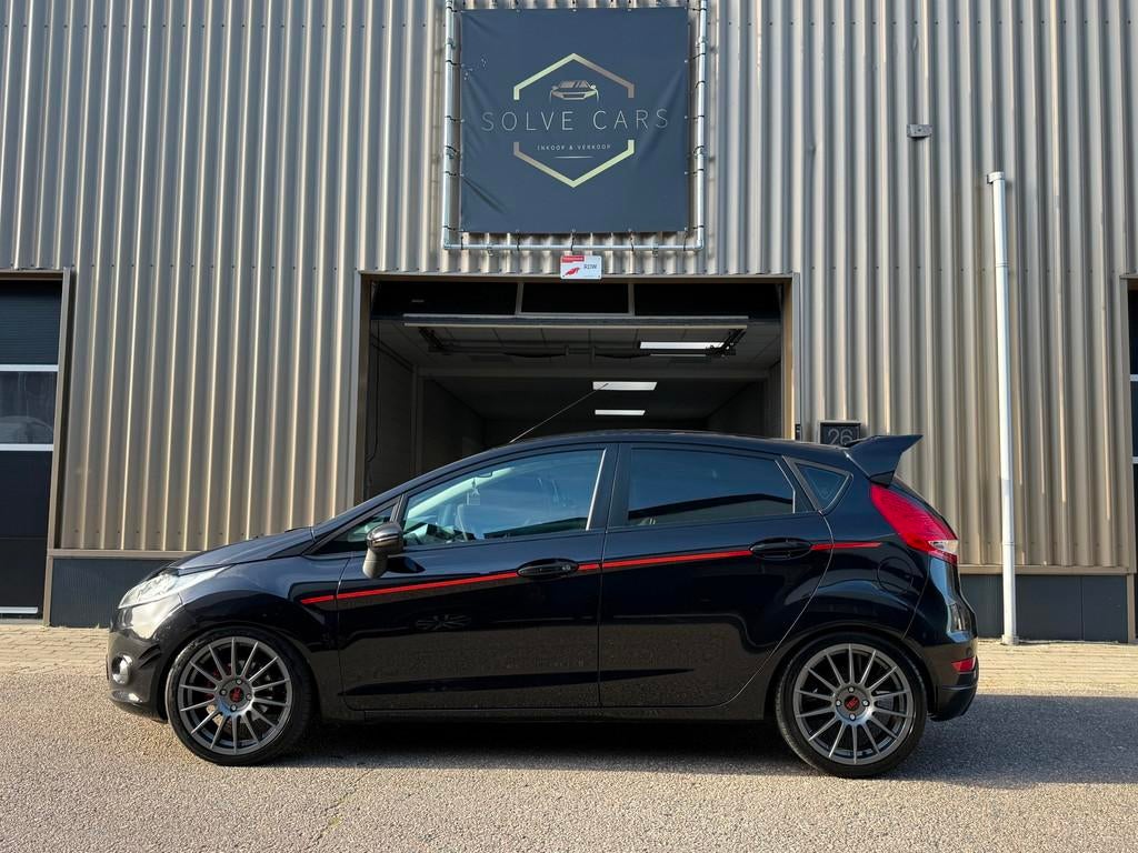 Ford Fiesta 1.25 Ghia UITLAATKLEP LED STOEL VERWARMING, Auto's, Voorwielaandrijving, Euro 5, Met garantie (alle), 82 pk