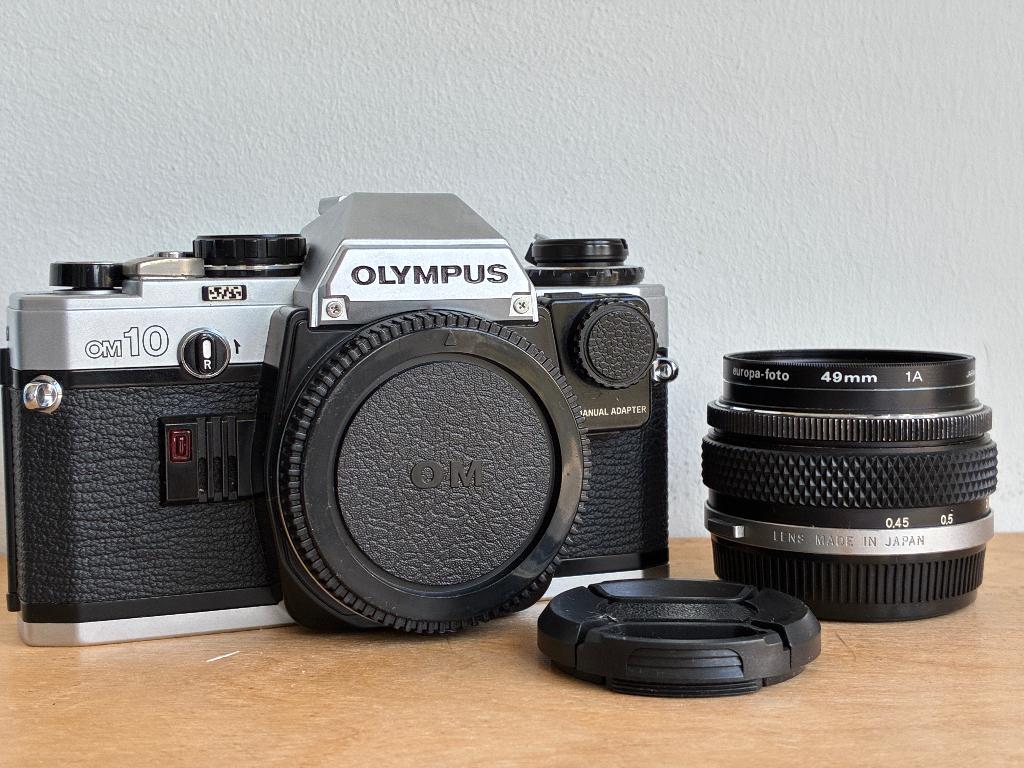 Olympus OM-10 + 50mm f/1.8 + manuele adapter, Audio, Tv en Foto, Fotocamera's Analoog, Ophalen, Refurbished, Spiegelreflex, Canon