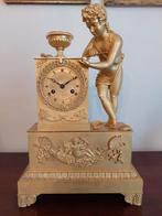 Pendule "de bellenblazer", omstreeks 1830, Ophalen