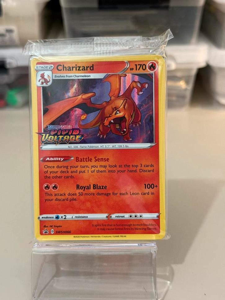Charizard Stamp Promo Vivid Voltage Sealed Swsh066, Hobby en Vrije tijd, Verzamelkaartspellen | Pokémon, Zo goed als nieuw, Ophalen of Verzenden