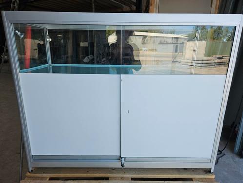 winkel of beurs vitrinekast, Huis en Inrichting, Kasten | Vitrinekasten, Gebruikt, 25 tot 50 cm, Glas, Ophalen