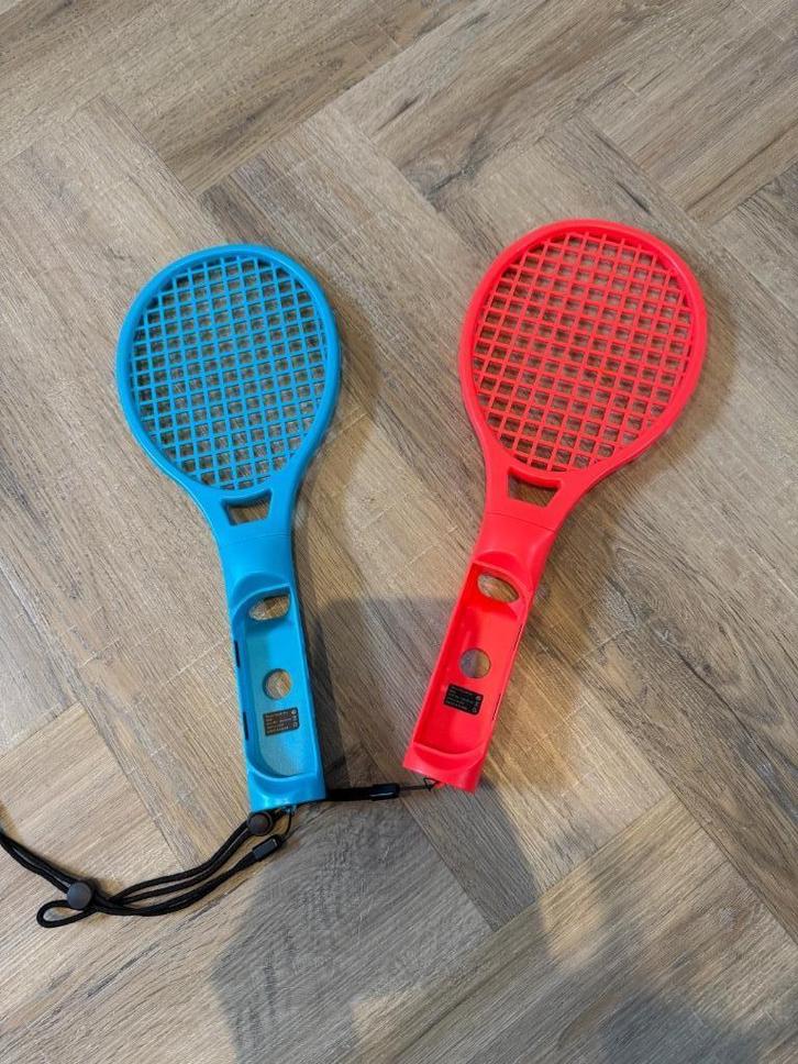 Nieuw 2x rood blauw Nintendo Switch tennis racket controller, Spelcomputers en Games, Spelcomputers | Nintendo Switch, Nieuw, Switch Original