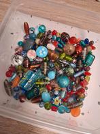 Glaskralen met bloemen en gouden details, Ophalen