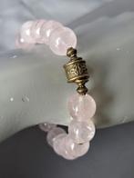 740 Edelsteen armband rozenkwarts (madagascar) 12mm, Nieuw, Ophalen of Verzenden, Elastiek, Roze