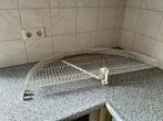 2 draai plateaus voor een draaikast (keuken), Ophalen