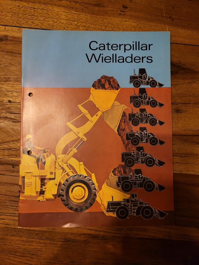 Caterpillar wielladers folder, Boeken, Ophalen of Verzenden