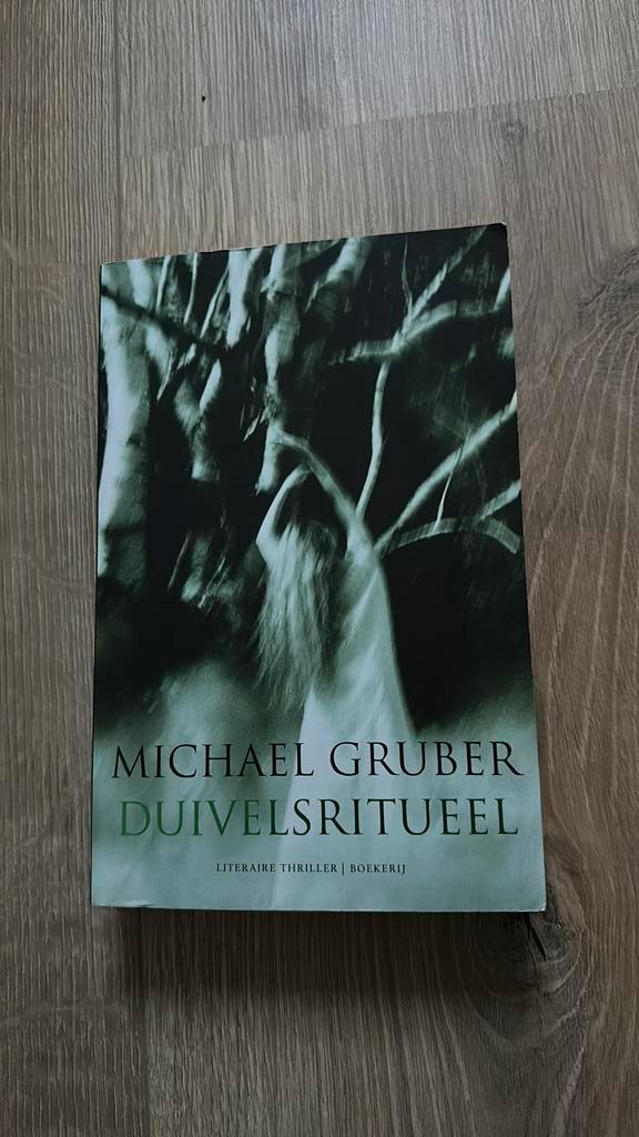 Michael Gruber - Duivelsritueel, Boeken, Thrillers, Zo goed als nieuw, Ophalen of Verzenden