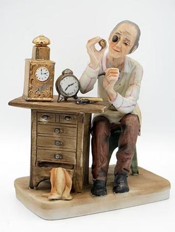 porseleinen beeldje “ uurwerkmaker / horlogemaker "  beschikbaar voor biedingen