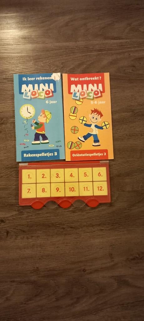 MINI logo met 2 boekjes, Ophalen of Verzenden