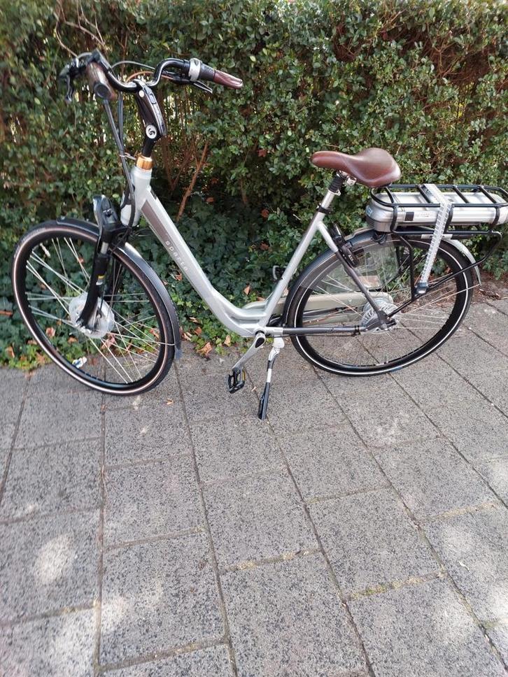 Nette elektrische damesfiets Sparta F8E, Fietsen en Brommers, Elektrische fietsen, Zo goed als nieuw, Sparta, 51 tot 55 cm, 30 tot 50 km per accu