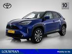 Toyota Yaris Cross 1.5 Hybrid 115 Dynamic (bj 2024), Auto's, 12 maanden, Stof, Gebruikt, Blauw
