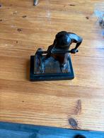 Bronzen beeld van een gieter, Ophalen