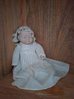 Antieke porseleinen pop, Ophalen