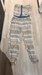 (27). Gekleurde dames jumpsuit. Maat M., Ophalen of Verzenden, Gedragen