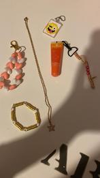 Pakket ketting-sleutelhangers-juicy bomb, Ophalen of Verzenden, Zo goed als nieuw, Goud, Overige materialen