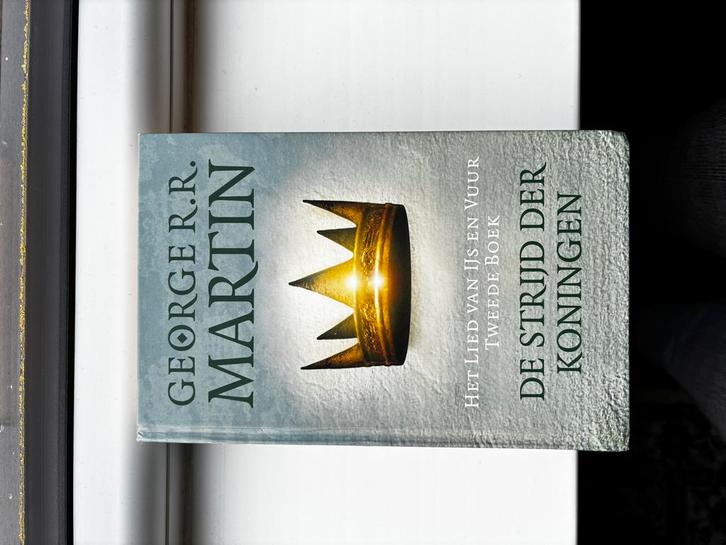 George R.R. Martin - De strijd der koningen, Boeken, Fantasy, Zo goed als nieuw, Ophalen of Verzenden