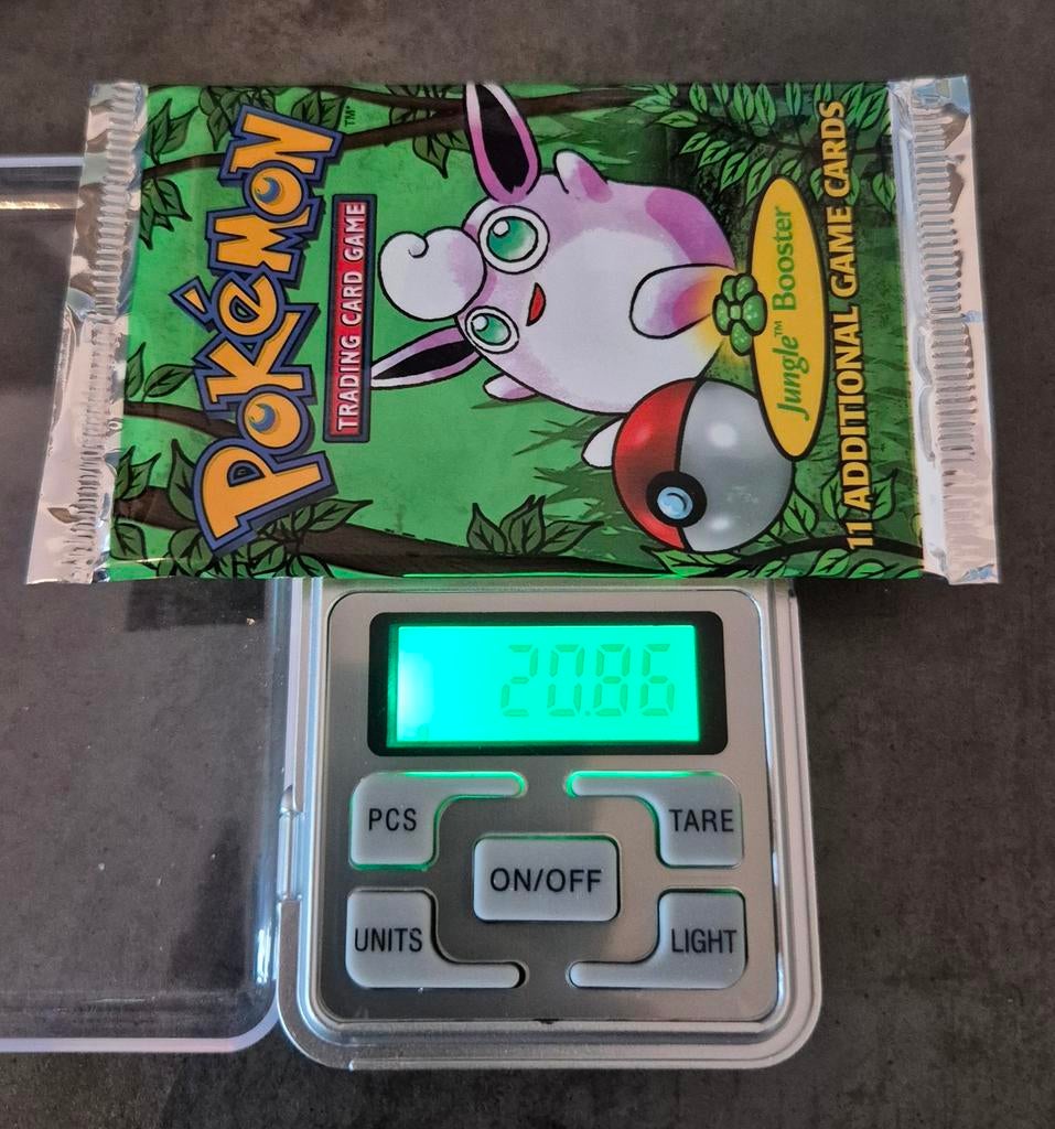 Jungle Booster Pack Sealed 20.86 Gram, Ophalen of Verzenden, Zo goed als nieuw