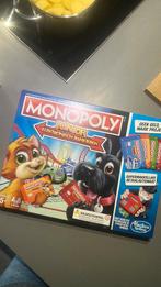 Monopoly junior elektronisch bankieren., Hobby en Vrije tijd, Gezelschapsspellen | Bordspellen, Ophalen of Verzenden