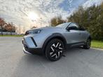 Opel Mokka 1.2 100pk Start/stop 2023 Grijs, Auto's, Voorwielaandrijving, Stof, Zwart, 1199 cc