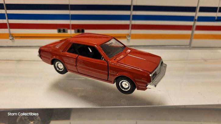 Yonezawa Diapet Mitsubishi Sapporo Red, Hobby en Vrije tijd, Modelauto's | Overige schalen, Zo goed als nieuw, Auto, Ophalen of Verzenden