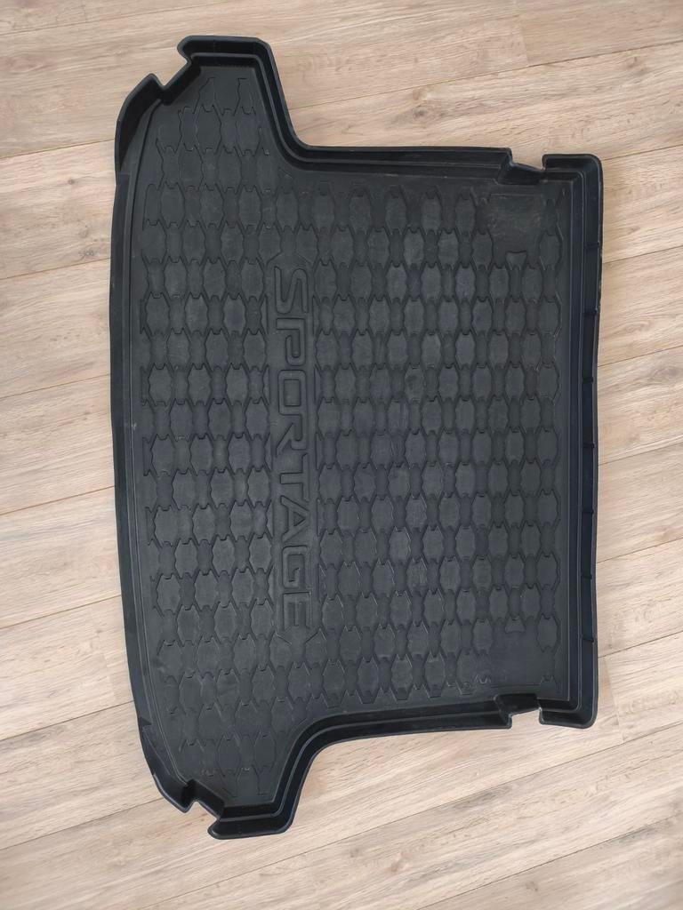 Kofferbakmat Kia Sportage, Ophalen