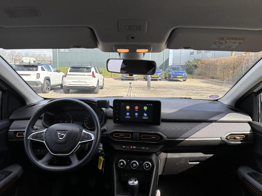 Dacia Sandero Stepway 1.0 TCe 100 Bi-Fuel Comfort | Trekhaak, Auto's, Voorwielaandrijving, Met garantie (alle), 610 kg, Wit