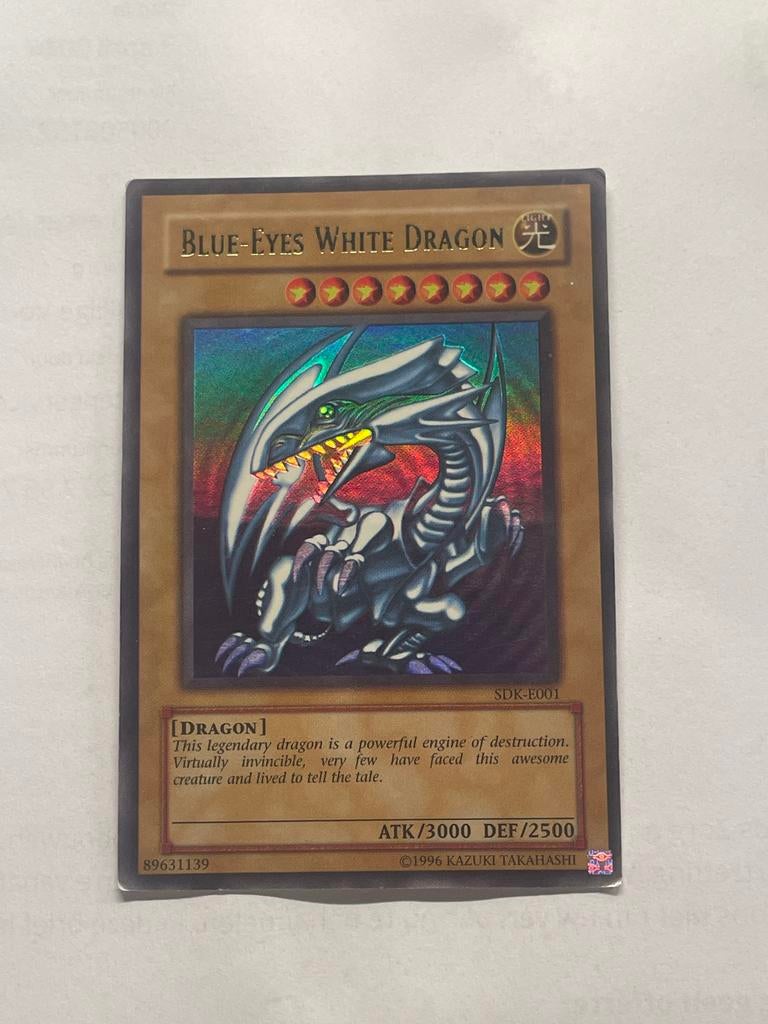 Blue-Eyes White Dragon SDK-E001 - te koop!, Ophalen of Verzenden, Gebruikt, Losse kaart