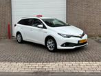 Toyota Auris 1.8 Hybrid Touring 2017 | Dealer garantie, Wit, Origineel Nederlands, 1798 cc, Volledig hybride