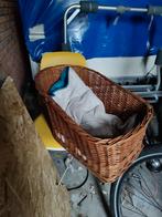 Hondenmand voor achterop de fiets, Ophalen