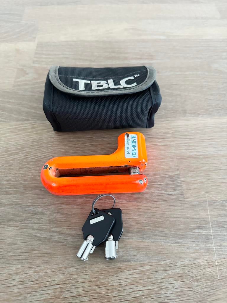 Schijfremslot incl 2 sleutels en opbergtasje, Ophalen of Verzenden, Zo goed als nieuw