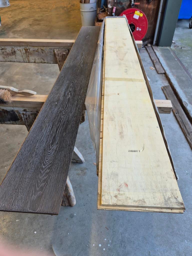 Zwart eiken lamelparket vloer op multiplex ondergrond, Ophalen