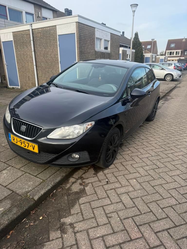 Seat Ibiza 1.2 51KW 2011 Zwart, Auto's, Voorwielaandrijving, Stof, 1198 cc, Handgeschakeld