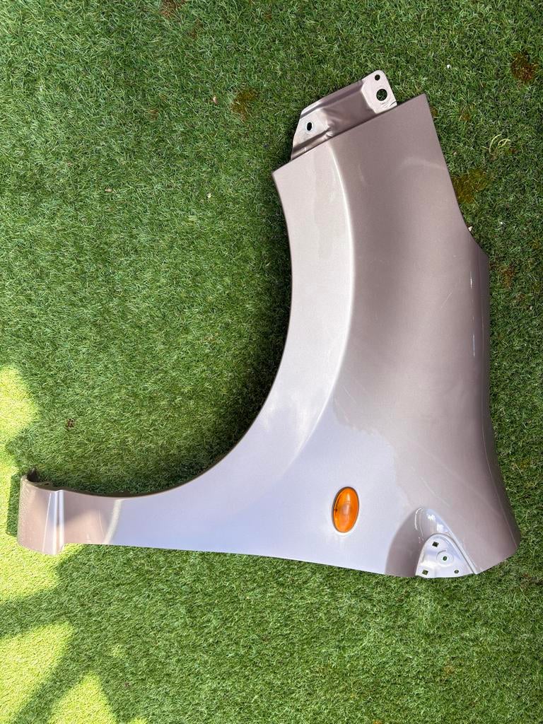 Links spatbord Suzuki Alto / Nissan Pixo (2009-2014), Ophalen of Verzenden