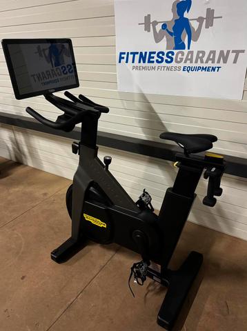 NIEUW Technogym Upright Bike Interactive Live 22 inch Fiets beschikbaar voor biedingen
