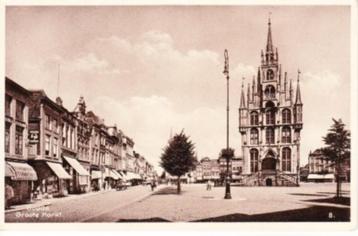 GOUDA,- Groote Markt. Winkel De Herder.Hond onder kar.25-09 beschikbaar voor biedingen