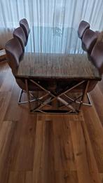 Glazen eettafel met metalen onderstel, 100 tot 150 cm, Ophalen of Verzenden, Zo goed als nieuw, Vijf personen of meer
