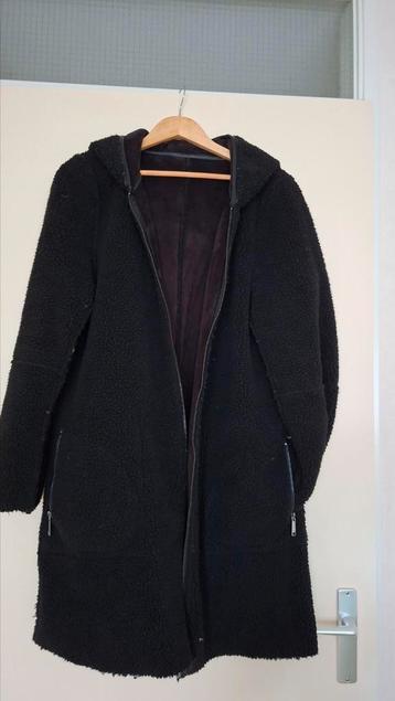 Warme winterjas (dames) beschikbaar voor biedingen