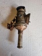 Antieke kaarslamp voor de fiets, Ophalen