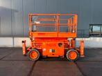 Skyjack SJ6832RT Schaarhoogwerker 12 meter (bj 2015), Zakelijke goederen, Machines en Bouw | Liften, Steigers en Ladders