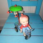 Blikken driewielertje met jongetje met paraplu opwindbaar, Antiek en Kunst, Antiek | Speelgoed, Ophalen