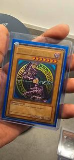 Dark Magician SDY-E005 1st Edition - Yu-Gi-Oh!, Ophalen of Verzenden, Gebruikt, Losse kaart