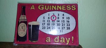 Guinness reclamebord in reliëf - kalender beschikbaar voor biedingen