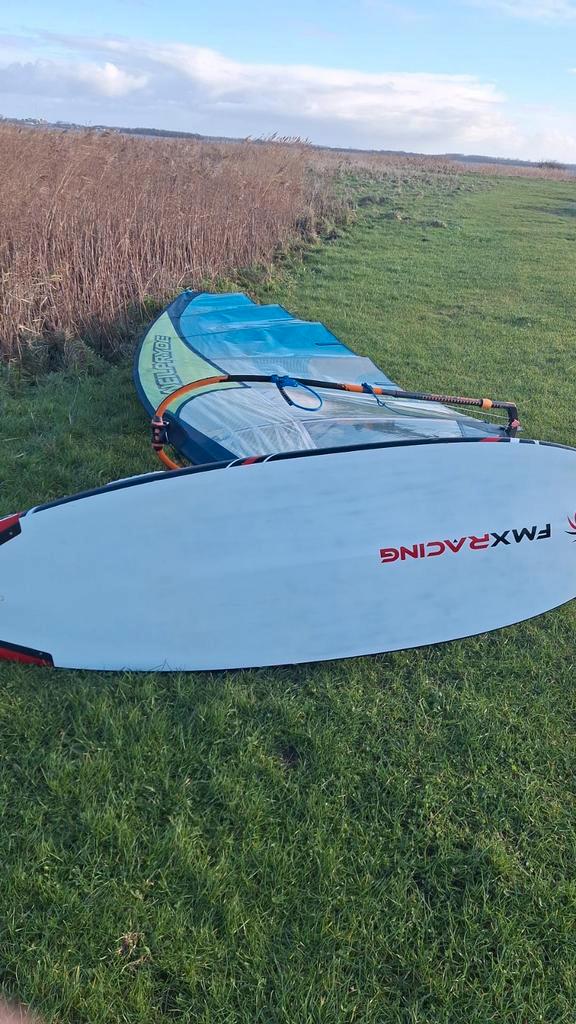Neilpryde evo racing 7.4, Watersport en Boten, Windsurfen, Zo goed als nieuw, Zeil, Minder dan 5 m², Ophalen of Verzenden