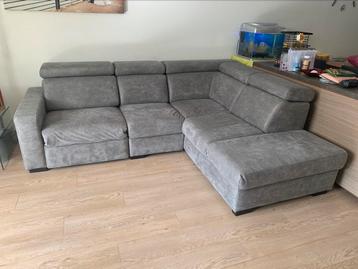 Kunstleder hoekbank met elektrische relax beschikbaar voor biedingen
