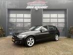 BMW 1-serie 116i High Executive Sport, Auto's, Gebruikt, 4 cilinders, Zwart, Leder