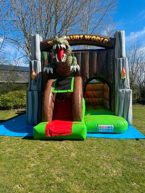 Springkussen Jurassic World slide combo te huur, Kinderen en Baby's, Speelgoed | Buiten | Springkussens, Zo goed als nieuw, Ophalen